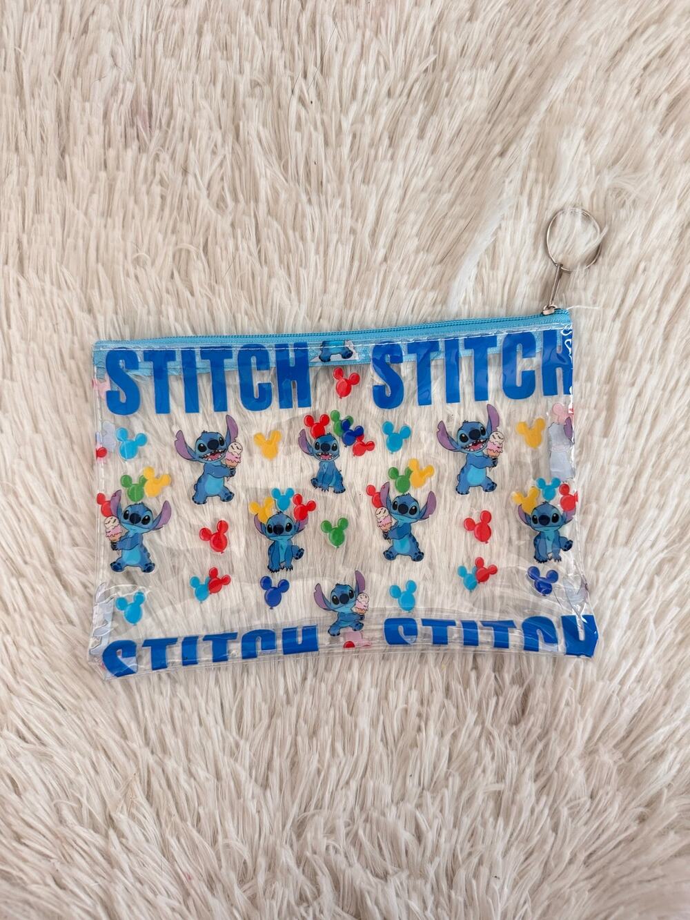 Disney Stitch clear pouch with blue Stitch characters and hearts zipper Keyring